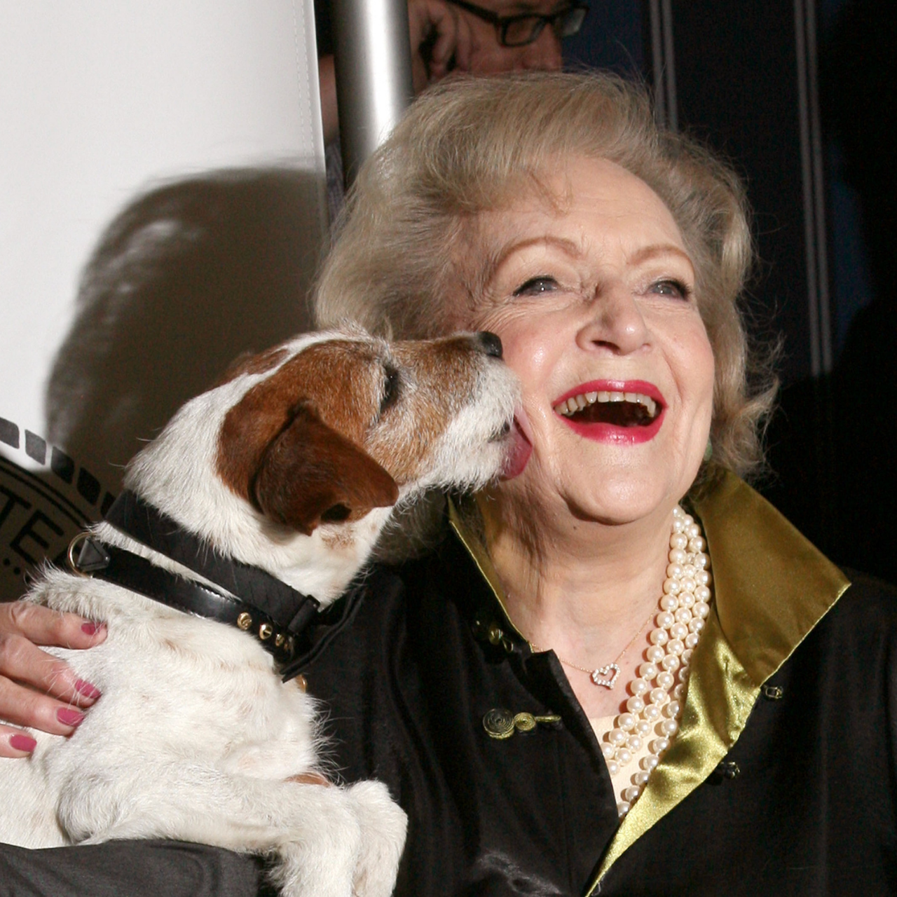 Betty White and Uggie the dog attends The Friars Club Salute to Betty White
