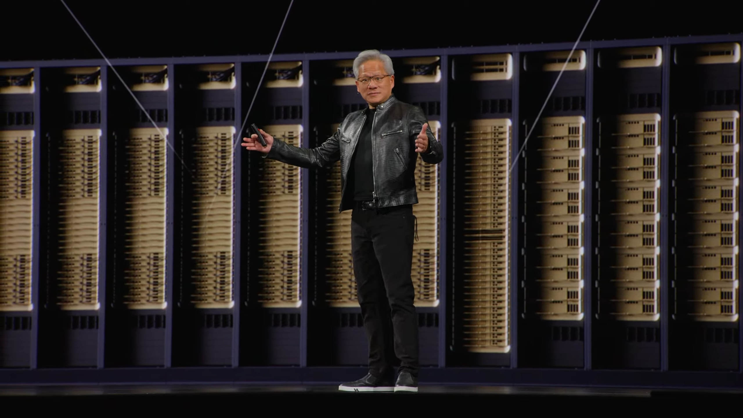 Jensen in front of a row of servers at Computex 2026
