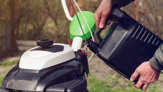 How to put gas in a lawn mower
