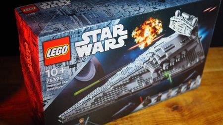 Lego Imperial Star Destroyer box on a wooden table