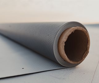roll of grey rubber membrane
