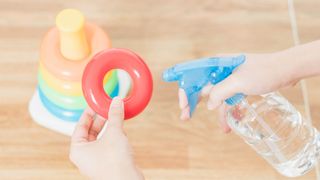 Spraying a plastic toy