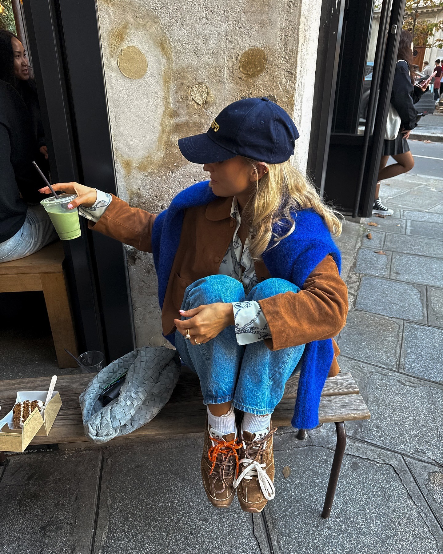 Fashion person Olivia wears the best brown trainers.