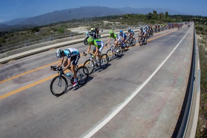 The peloton crosses the Santa Cruz river on the way to Santa Barbara.