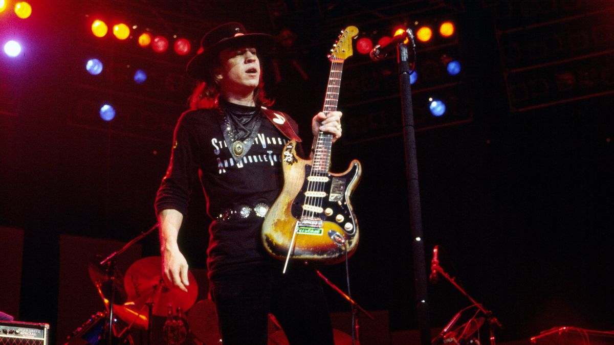 Stevie Ray Vaughan (1956 - 1990) plays electric guitar as he performs with his group Double Trouble during the 'Texas Flood' tour, onstage at Byrne Arena, October 22, 1983