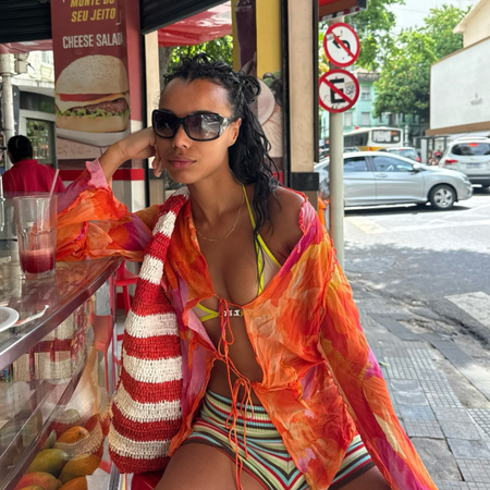 An image of a woman wearing colorful micro shorts trend summer 2026