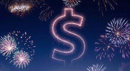 Night sky with fireworks shaped as a Dollar symbol