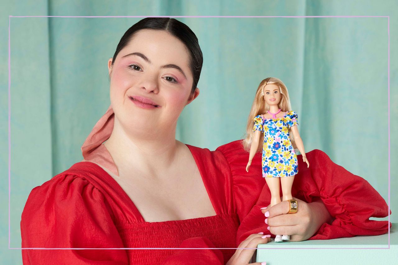 Model Ellie Goldstein holding Barbie&#039;s new doll with Down Syndrome