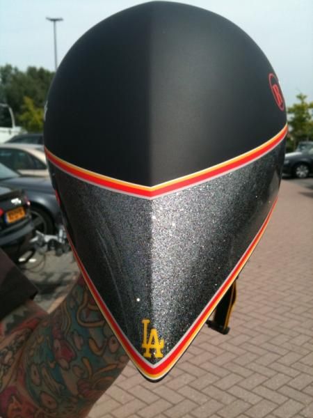 Armstrong's helmet was naturally finished off in a custom design to complement the fully custom construction and shape.