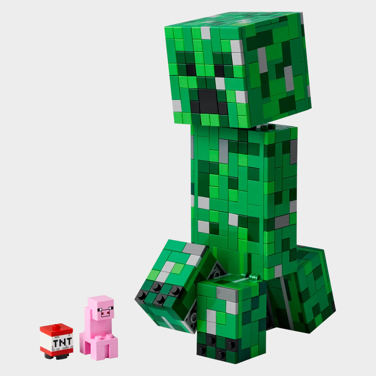 Lego The Creeper, TNT, and Pig models on a plain background