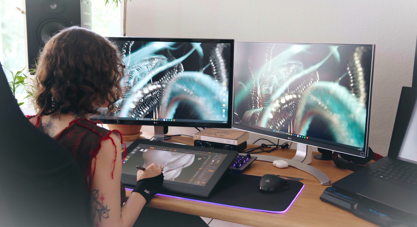 Giusy Amoroso using XPPen Artist Ultra 16 with two computer monitors