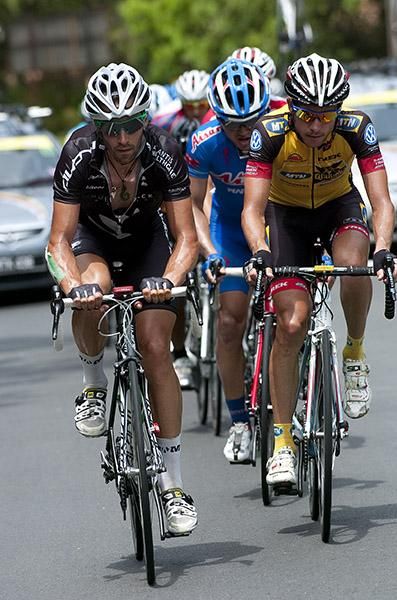 Joe Cooper (left) of the New Zealand National Team and Jaques Janse van Rensburg (MTN Qhubeka) lead the breakaway up a climb on stage seven.