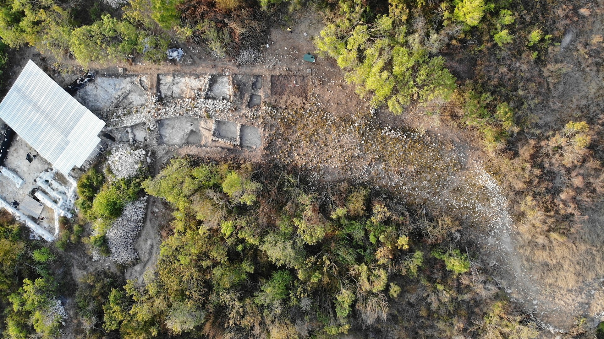 a bird's eye view of a large excavation site