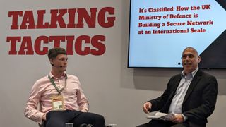Harry Gazzard, a solutions architect working for the MoD on its digital transformation project, speaking at a panel at Infosecurity Europe 2024.