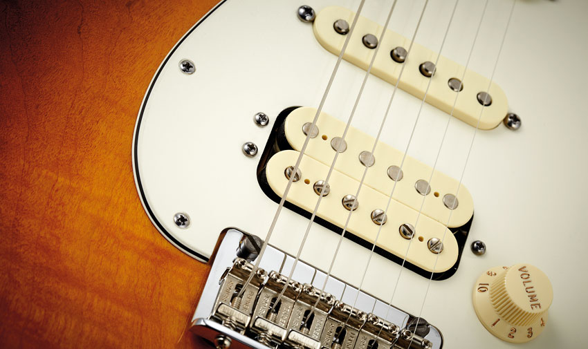 If you can't get on with the classic Strat's bridge single coil, a bridge humbucker (such as this Fender Twin-Head) is much more rock-ready