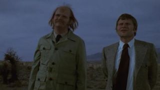 Two Men And A Scorpion