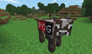 minecraft demo - a cow with the pc gamer logo on the side of it