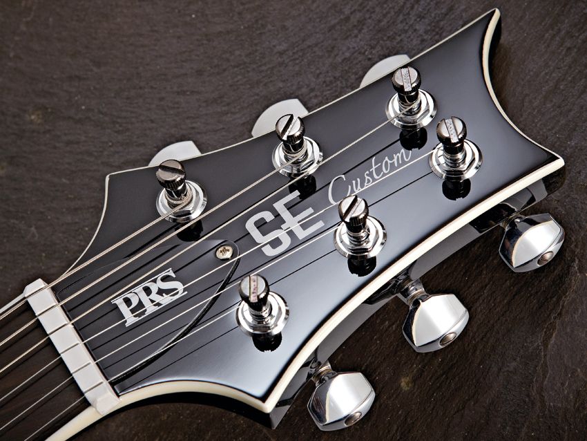 PRS's high-quality enclosed locking tuners aid tuning stability.