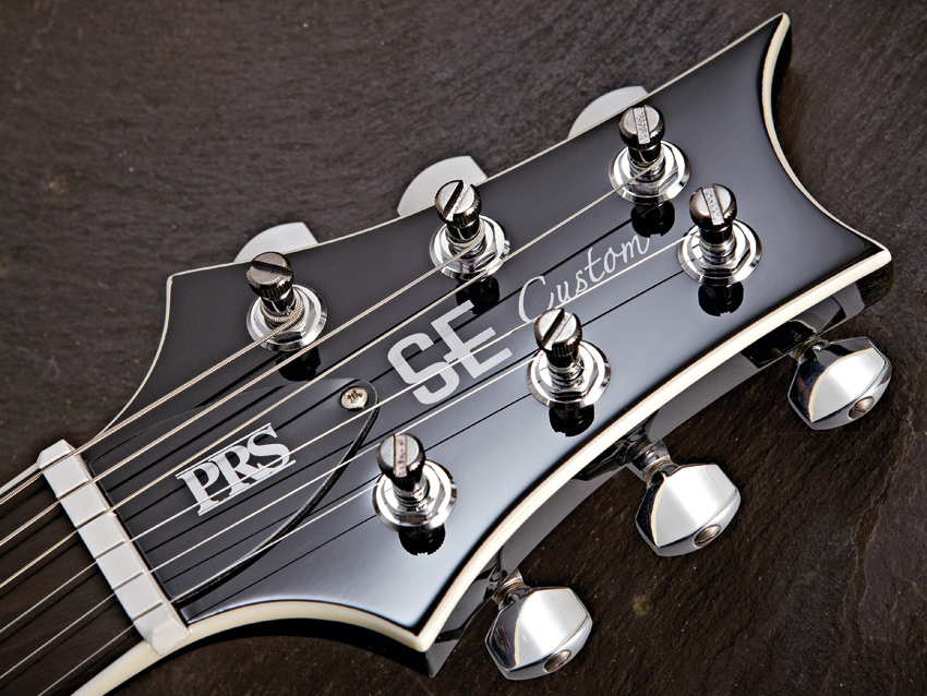 PRS's high-quality enclosed locking tuners aid tuning stability.