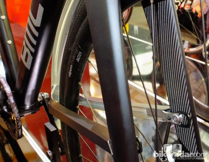 The front aluminium mudguard clips neatly in to place inside the fork legs