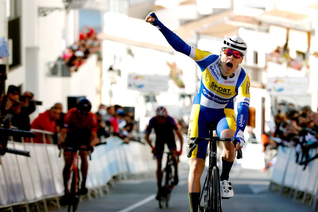 IZNAJAR SPAIN FEBRUARY 16 Rune Herregodts of Belgium and Team Sport Vlaanderen Baloise celebrates winning ahead of Stephen Bassett of United States and Human Powered Health Team and Ander Okamika Bengoetxea of Spain and Team Burgos BH during the 68th Vuelta A Andalucia Ruta Del Sol 2022 Stage 1 a 2007km at stage from Ubrique to Iznjar 514m 68RdS on February 16 2022 in Iznjar Spain Photo by Bas CzerwinskiGetty Images