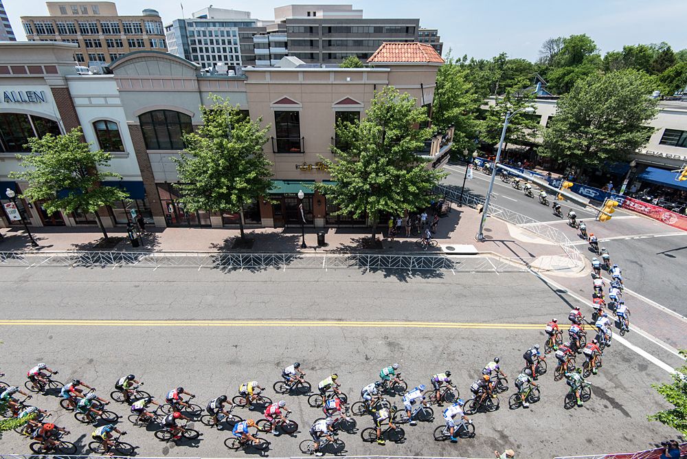 Riders head through the final turn onto the finishing straight