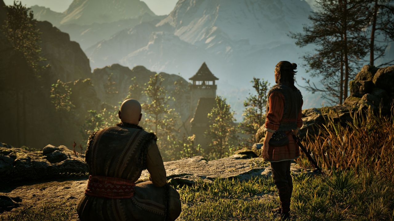 The Blood of Dawnwalker gameplay, showing Coen and his father looking at a distant tower beneath the mountains