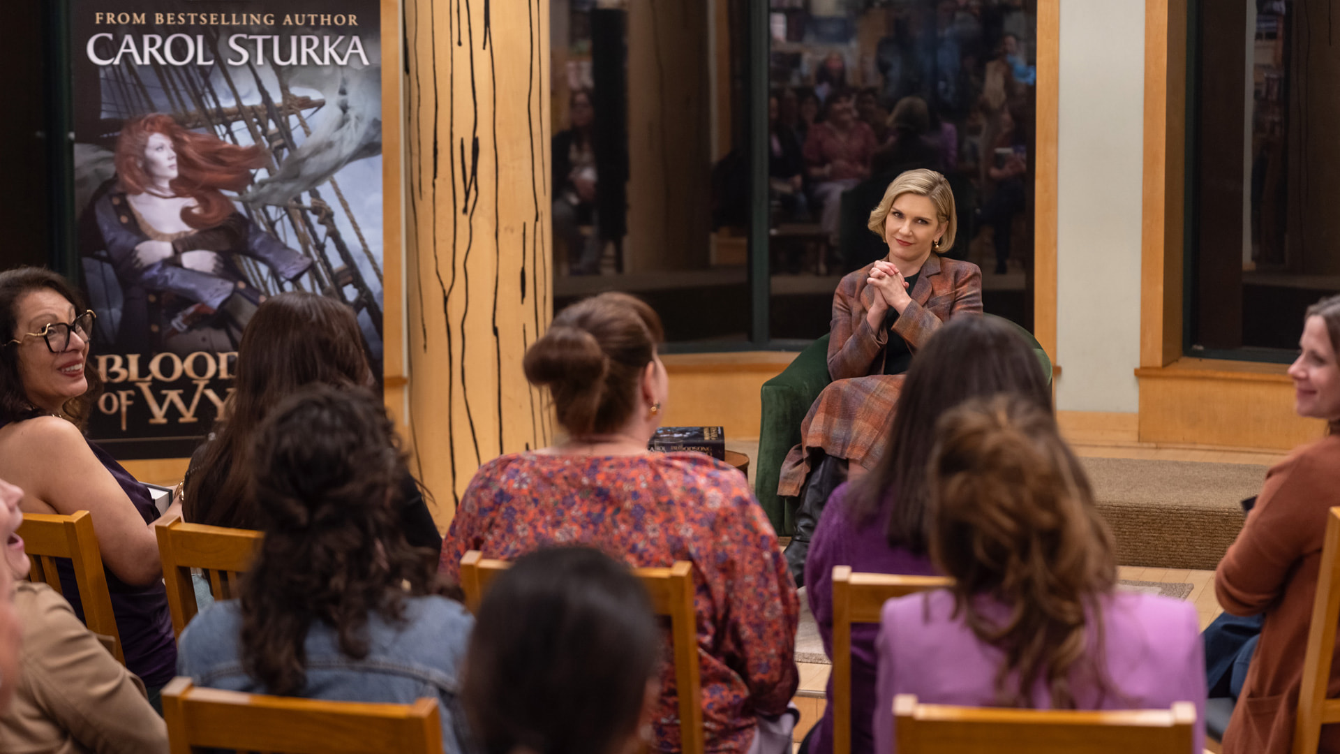 a female author at a book signing event