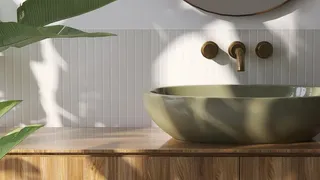 White bathroom with green sink