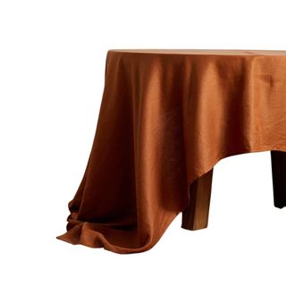 A rust colored tablecloth
