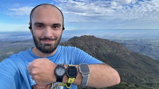 The author wearing an Apple Watch Ultra 2, COROS PACE 3, and Garmin Forerunner 965 at the Mount Diablo summit. 