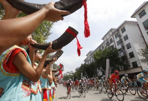 The peloton sets off on stage one of the Tour of Hainan.