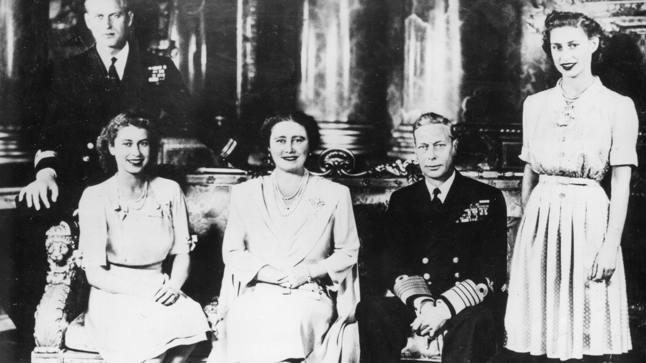 The Royal Family of Britain, including Princess Elizabeth&#039;s fiance Lt Philip Mountbatten, London, England, November 15, 1947. Left to right: Lt Mountbatten, Princess Elizabeth, Queen Elizabeth, King George VI and Princess Margaret Rose.