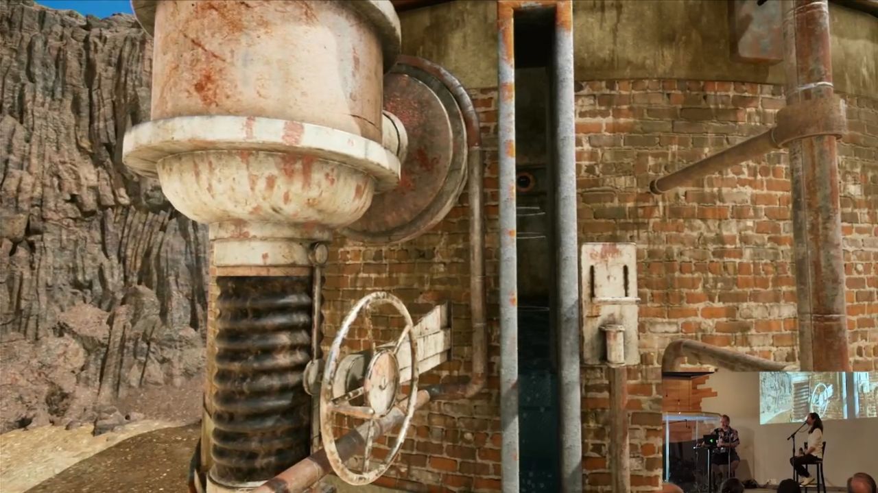 on-stream view of gameplay from the remake of Riven: The Sequel to Myst, showing a boiler on the shore of a crater lake with scaffolding going out into the middle of the lake