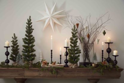 Christmas decorations along a mantlepiece