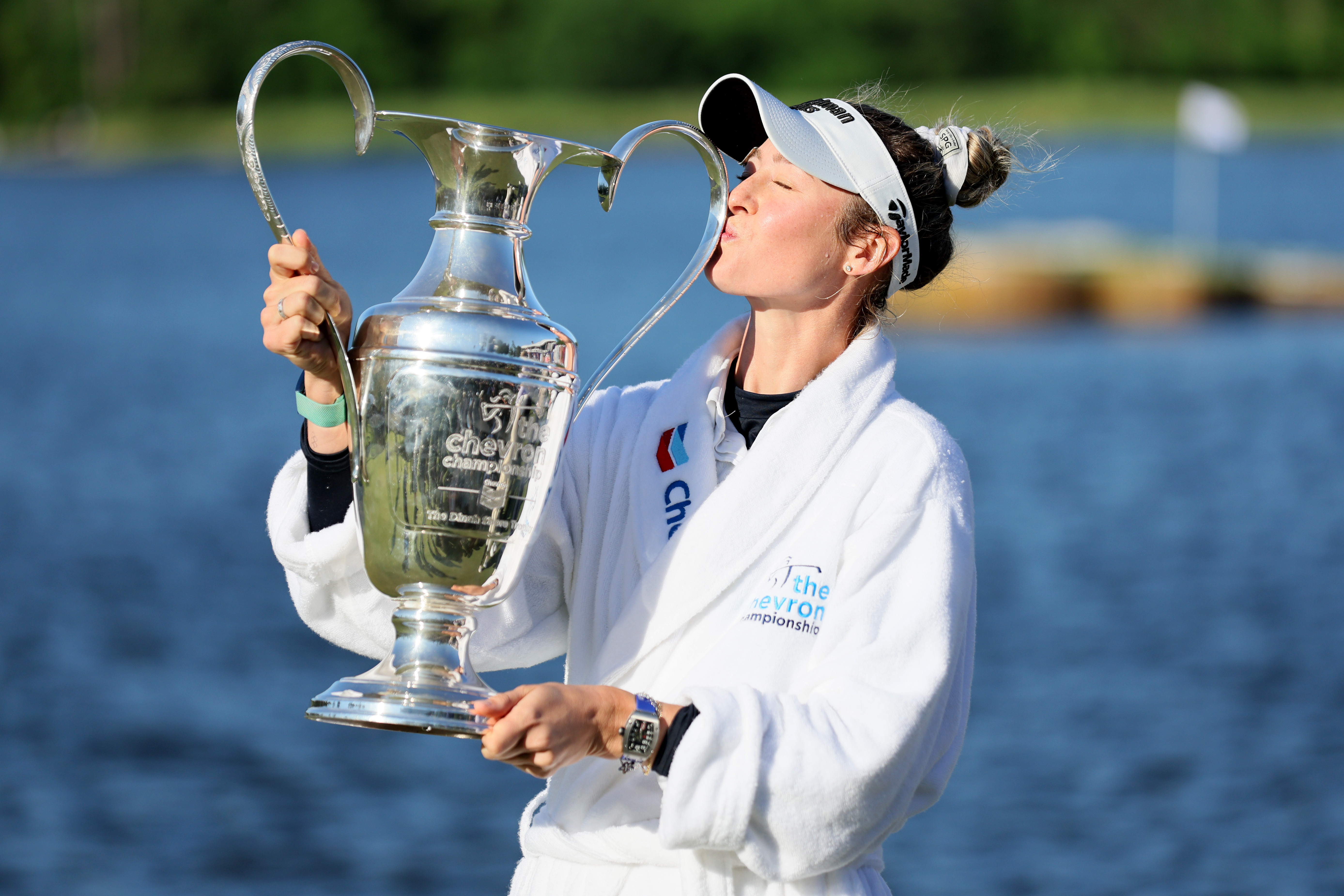 Nelly Korda kisses the trophy after another win