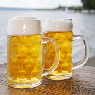 beer glasses on wooden surface