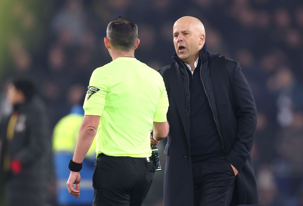 LIVERPOOL, ENGLAND - FEBRUARY 12: Arne Slot, Manger of Liverpool, shakes hands with Match Referee Michael Oliver following the Premier League match between Everton FC and Liverpool FC at Goodison Park on February 12, 2025 in Liverpool, England. (Photo by Carl Recine/Getty Images)