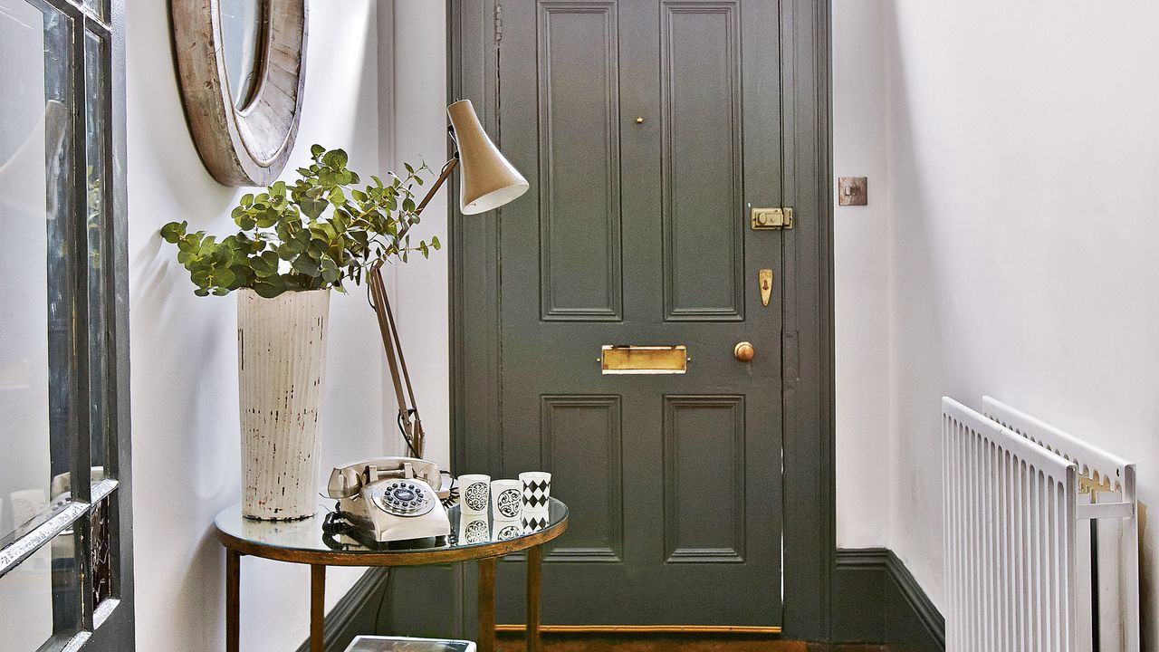 hallway with table and lamp