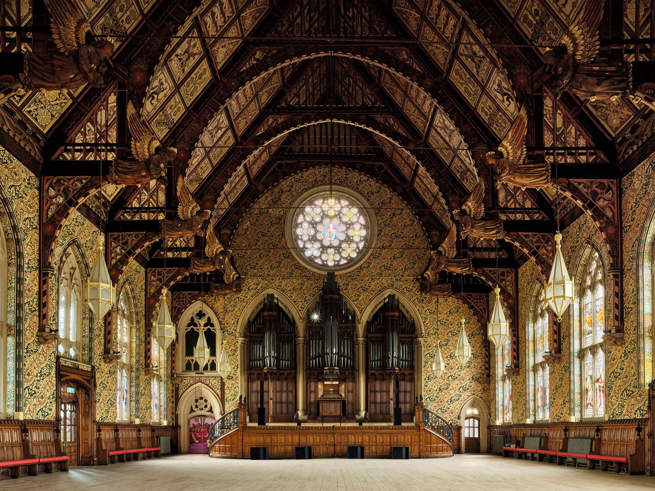 Fig 1: The richly decorated Great Hall, with its hammerbeam roof and grand organ.