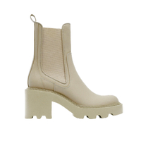 SAVE: Zara Rubberized Heeled Ankle Boots
Make countryside wellies city-appropriate with this chunky heeled pair from Zara. Practical and polished, keep the look tonal and team with neutral hues for a catwalk-ready feel.