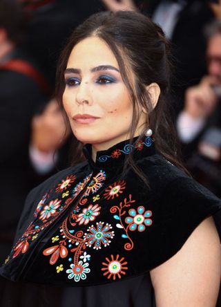 Asmae El Moudir attends the "Furiosa: A Mad Max Saga" Red Carpet at Cannes Film Festival 2024