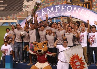 Universitario de Deportes celebrate their Peruvian championship title in 2013.