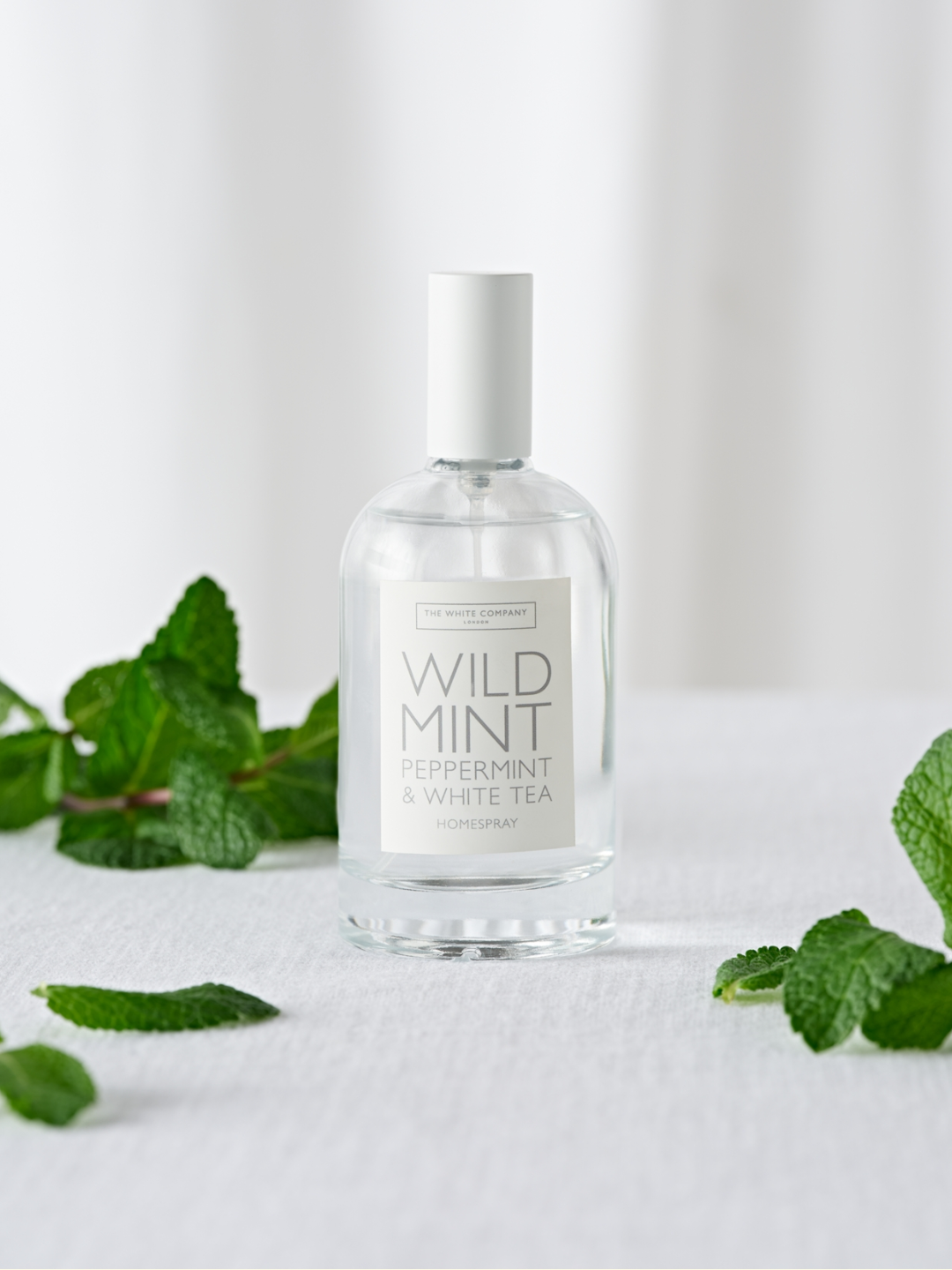A bottle of mint room spray from The White Company