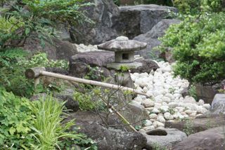 A Japanese rock garden with water feature