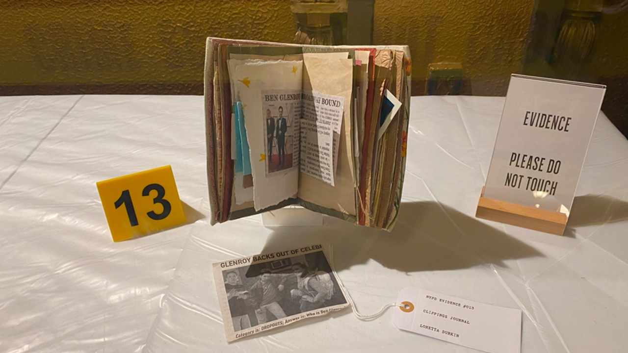 Loretta's journal with photos of Dickie and Ben from Only Murders in the Building.