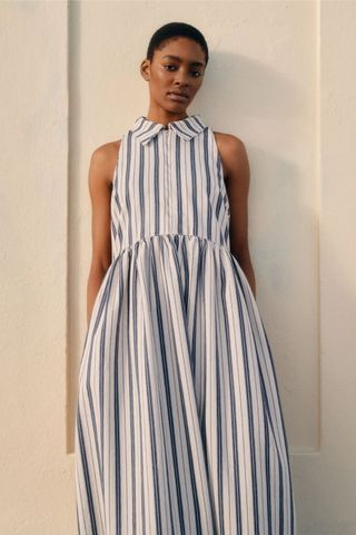 woman wearing a Striped dress