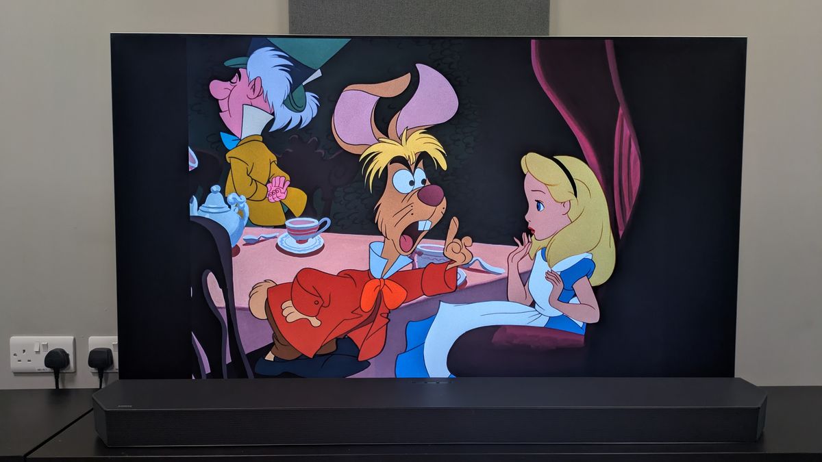 Alice in Wonderland (1951) 4K Blu-ray on LG G6 showing a shot of the March Hare, Alice and The Mad Hatter
