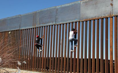 Steel slat border wall.