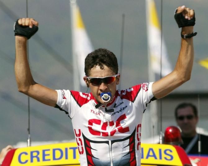 Carlos Sastre (CSC) celebrates as he crosses the finish line of at Ax-3 Domaines in the 2003 Tour de France.